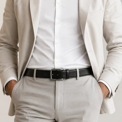 man wearing CORVIKO Arven black classic belt with light formal outfit