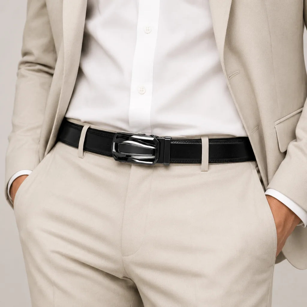 man wearing CORVIKO Aureon black automatic belt with elegant light formal outfit