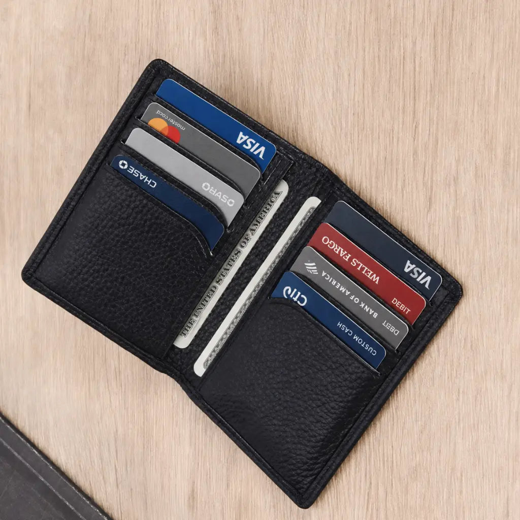Black vertical card holder for men with cards and cash organized inside