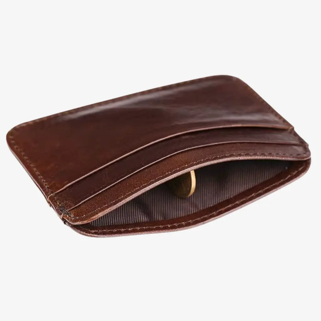 Brown leather card holder for men showing open pocket detail for small essentials