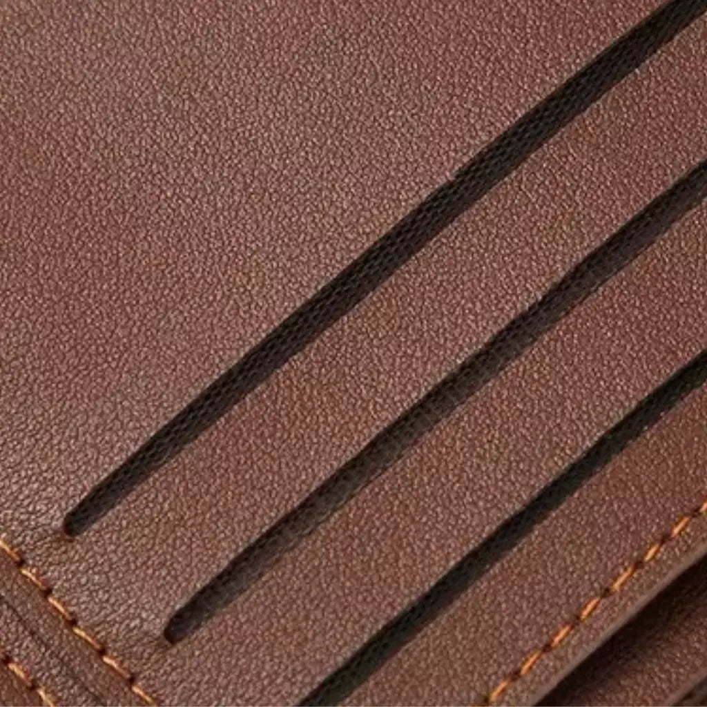 Close-up rear view of the brown slim wallet showing stitching and texture.