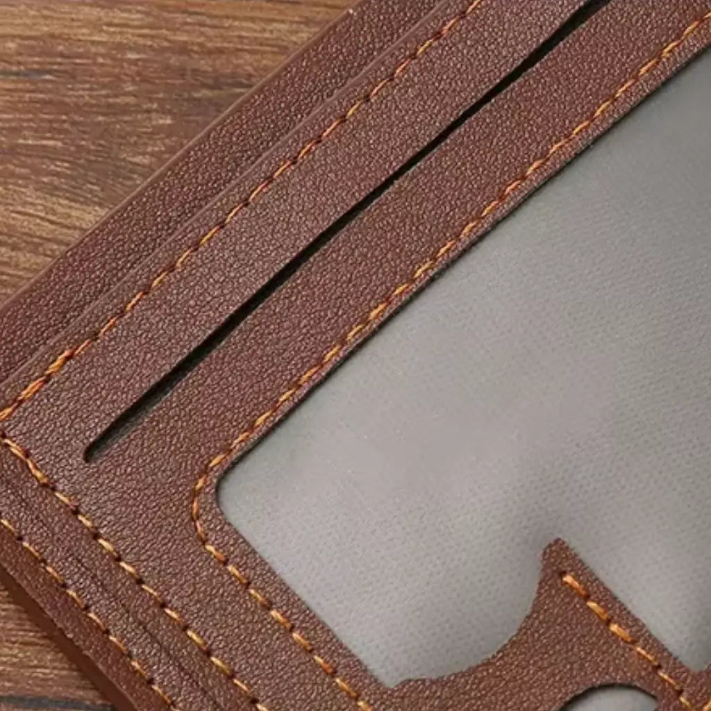 Close-up of the wallet interior with card slots and a transparent ID window.